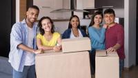 A group of prospective students packing for a move into their new residence